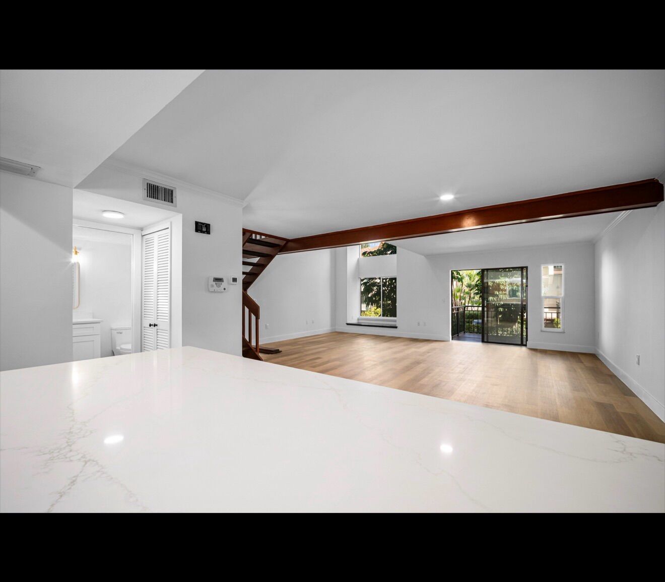 Marble countertop opening into finished living area